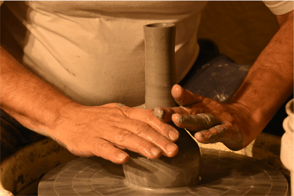 Ancient Creations Ceramics wheel throwing a cremation memorial keepsake urn for ashes. 