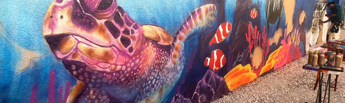 “Underwater and hot rod mural at a private residence in Cape Coral, Florida — painted by Artsemble Underground artists Brian Weaver and Cesar Aguilera, blending a classic car with an ocean scene to create a magical and uplifting fusion of imagination and personality.”