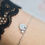 Thumbnail: Bracelet symbole argenté