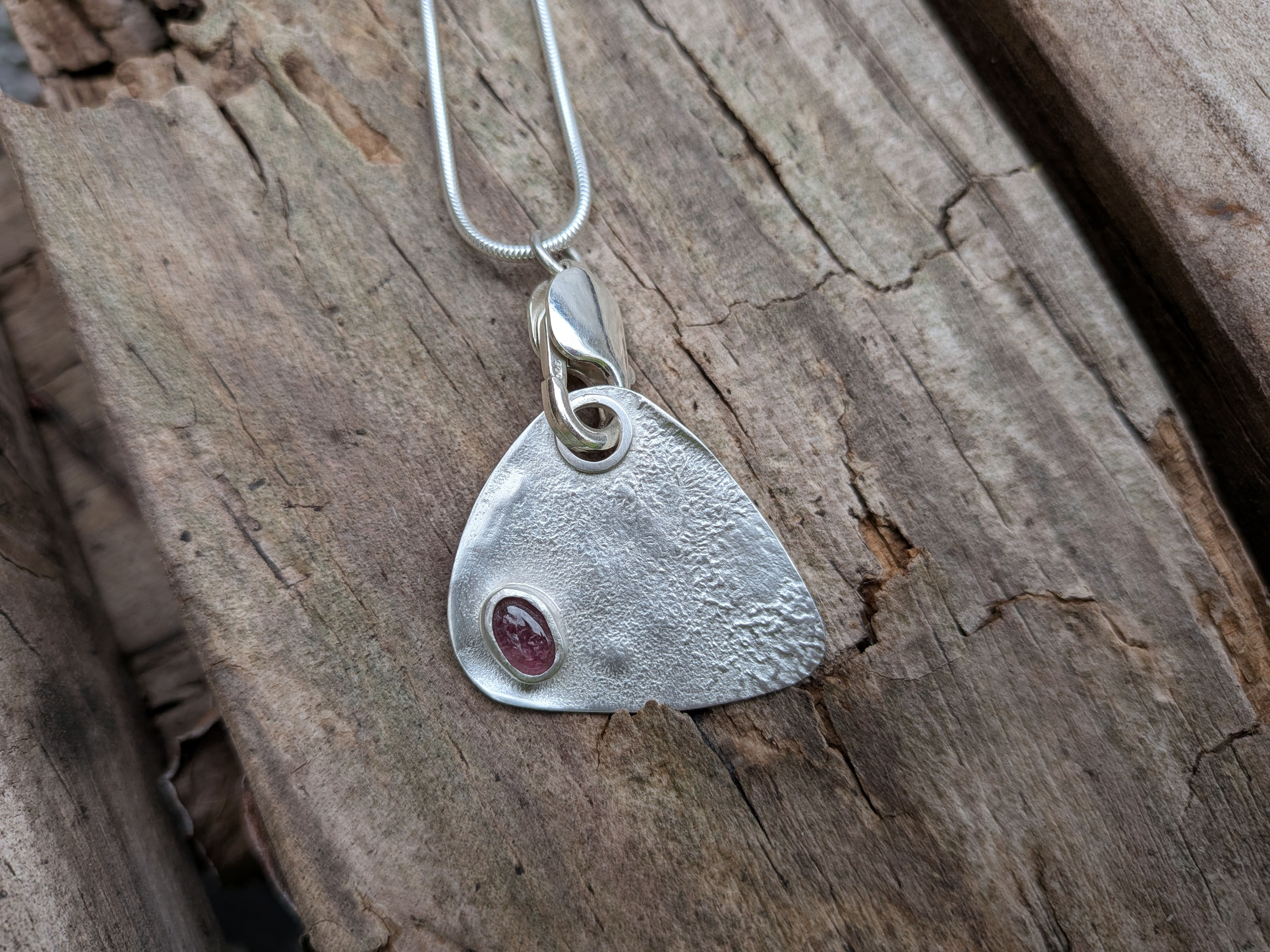 Silver Guitar Plectrum with pink Tourmaline