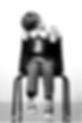 Boy looking sad sitting in a chair