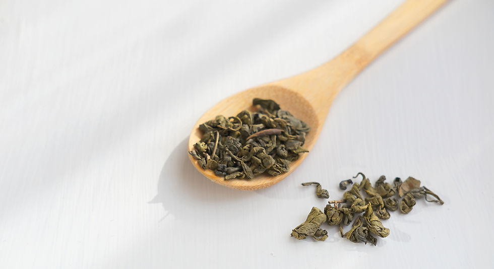 Green_Tea_Leaves_In_A_Spoon_original_1096663 3_edited.jpg