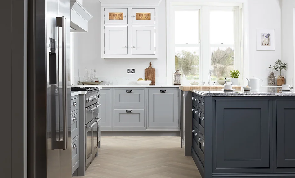 Two-tone blue-ish grey in-frame kitchen with built-in American fridge freezer