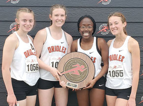 Girls’ relay team capture school’s first ever Howard Wood Dakota Relay title
