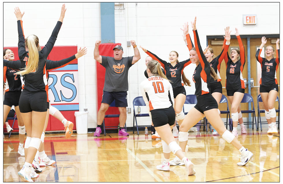 The Lennox High School volleyball team celebrates after winning the Bon Homme Tournament on Saturday, Sept. 20.