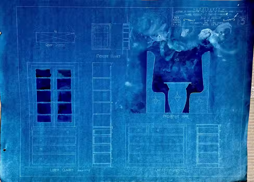 cyanotypes and paitnings laid on top of maps by artist Barbara Benish for series  'Climate House'