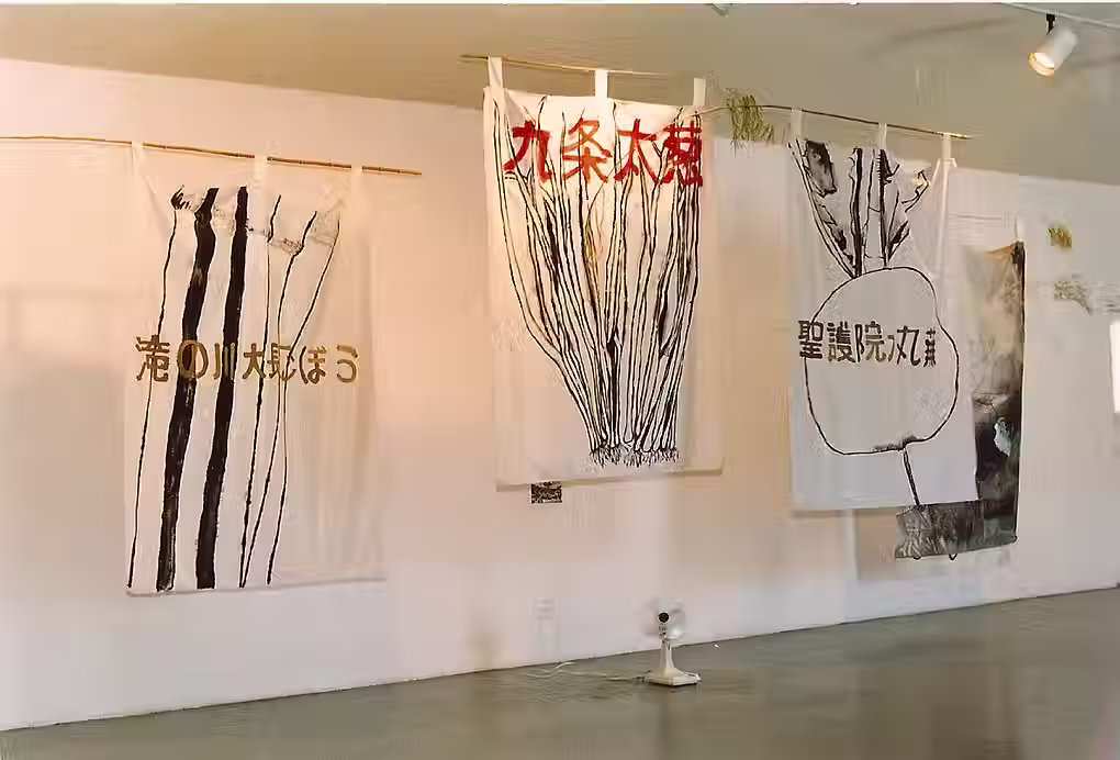 large paintings and prints by artist barbara benish hanging in gallery for her exhibition 'Lanuda Bay' 