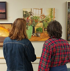 People looking at art