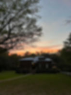 Hunting lodge at sunset at a deer hunting outfitter in SC.