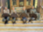 Four hunters with harvested turkeys at a deer hunting outfitter in SC