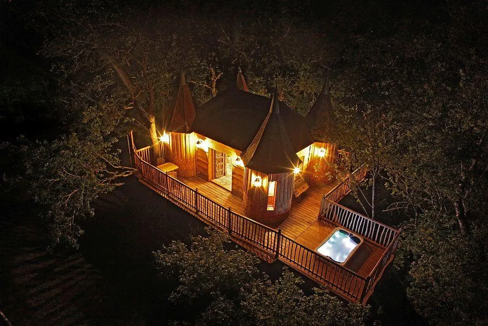 Châteaux dans les Arbres, France 10 Nature's Secret Hideaways: Journeying into the realm of Tree House Escapes unsplash photos images disney tree houses thailand tree house villas tree hotel sweden