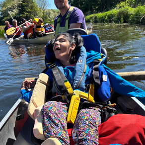 A smiling child in a life jacket enjoys a boat ride on a sunny river. Text: Craighalbert Courier, Issue 6, June 2025, Enabling children to achieve.