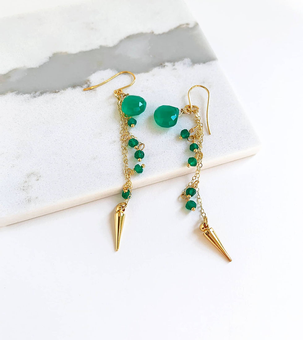 Thumbnail: Dangle gold earrings with green onyx gemstones and a golden spike at the end on the earring.