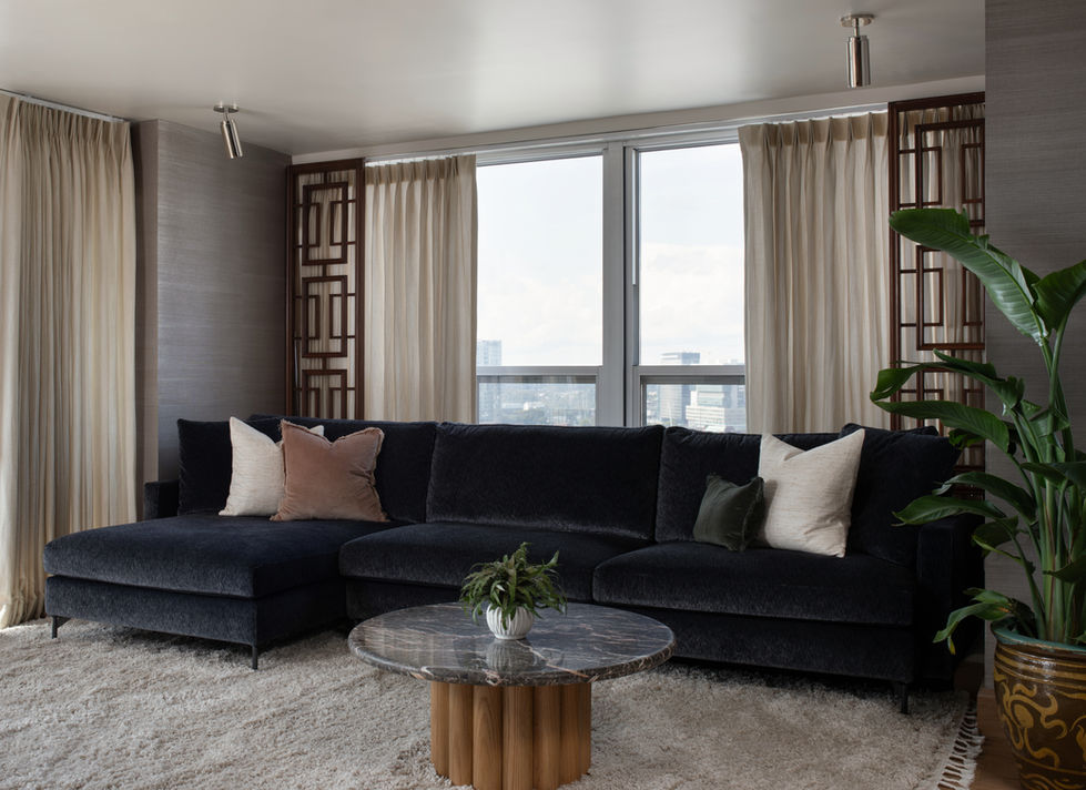 Our Mid-Century Project living room with seagrass wallpaper and vintage chinoiserie screens. The coffee table is Soho Home and the window treatments are from The Shade Store.