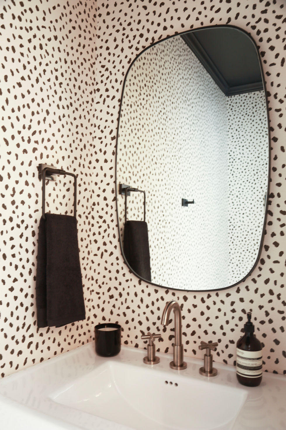 Our Corinthian Project powder bath with Thibaut wallpaper and Signature Hardware fixtures.