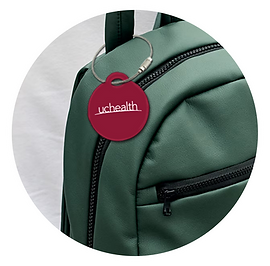 UCHealth branded ReturnMe bag tag on bag