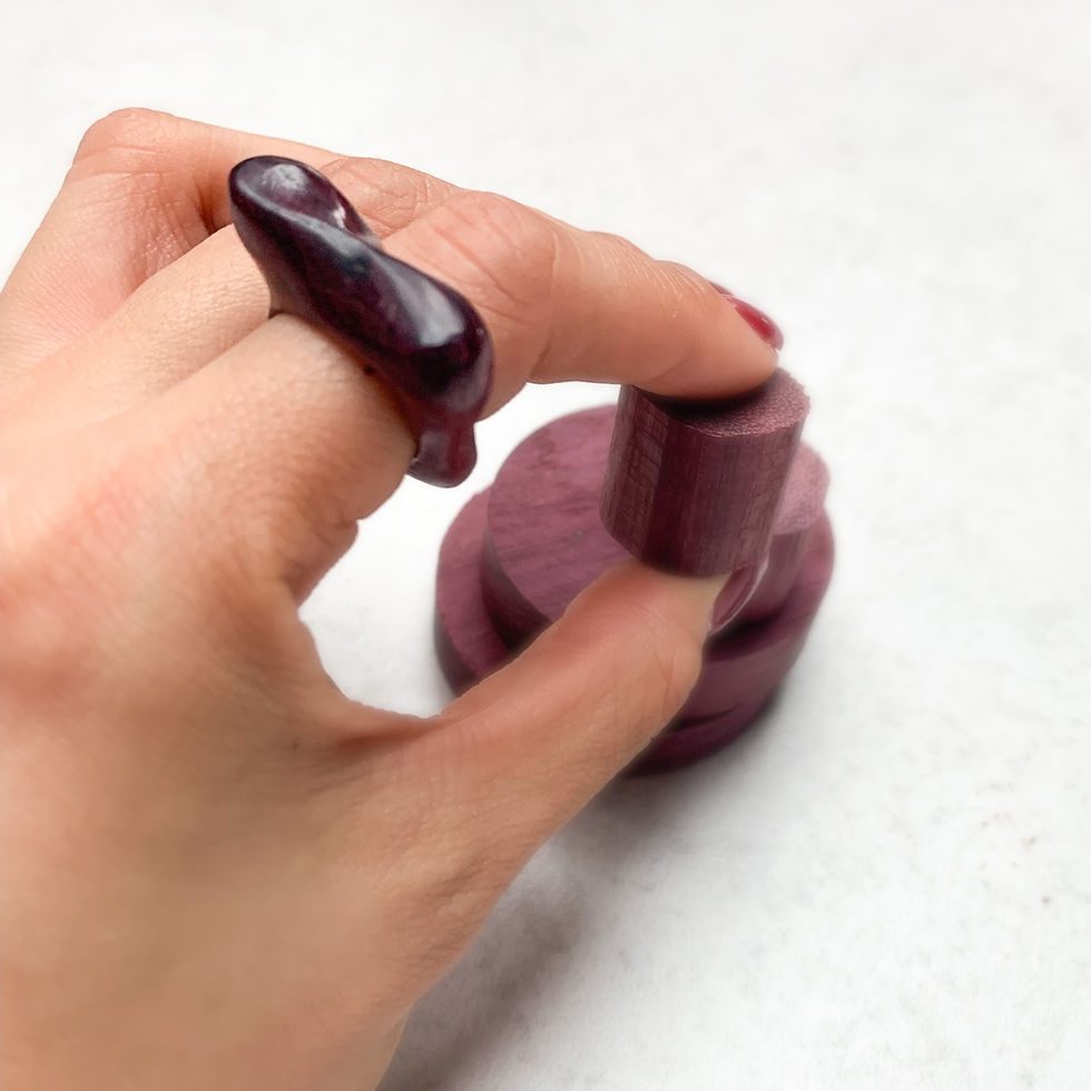 Thumbnail: The dancing wood ring in purple heart wood