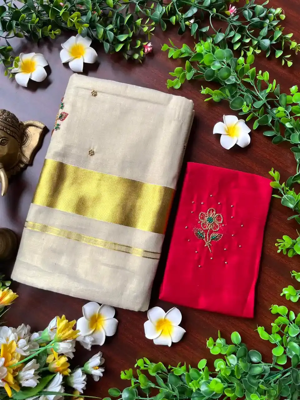 Multi Floral Beads Tissue Kerala Kasavu Saree with Blouse image folded view