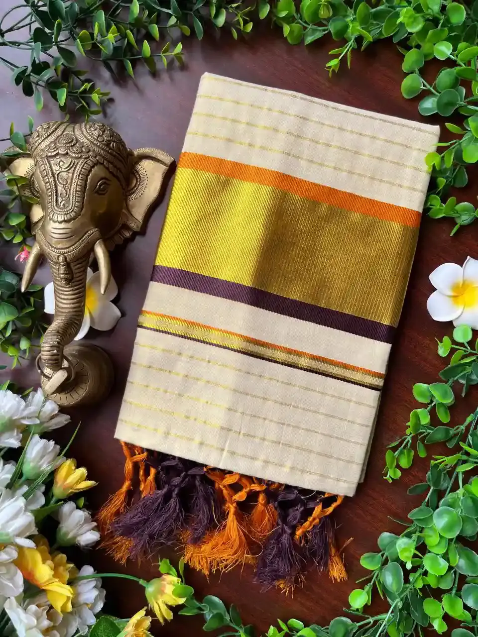 Coffee Brown Oranage Stripe Tussel Tissue Kerala Kasavu Saree image folded view