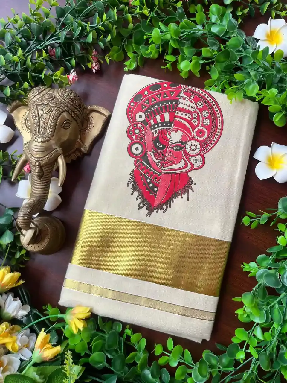 Thumbnail: Red Kathakali Motif Tissue Kerala Kasavu Saree image folded view