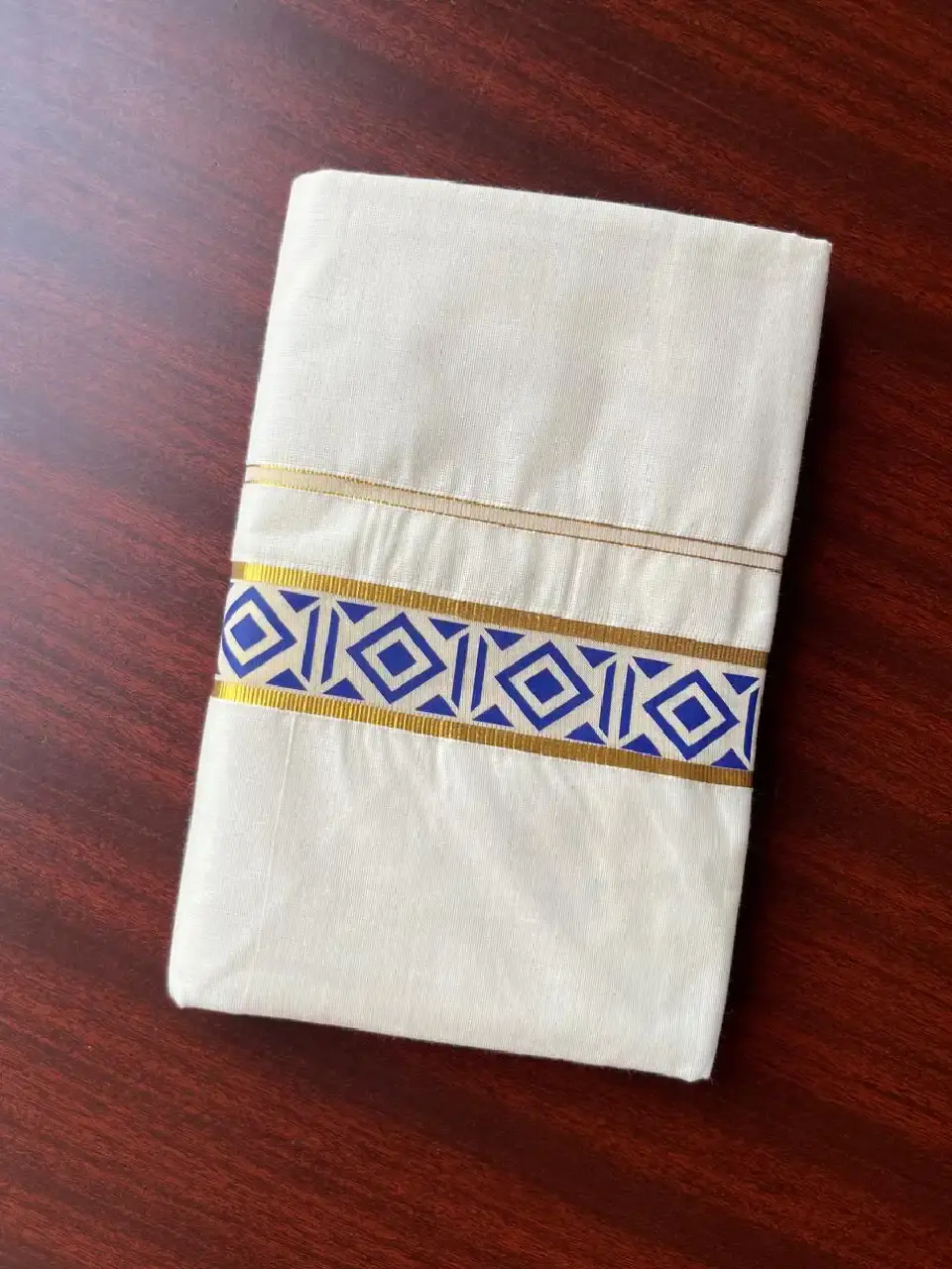 Indigo Diamond Motif Hand-Painted Golden Kasavu Double Mundu image folded view