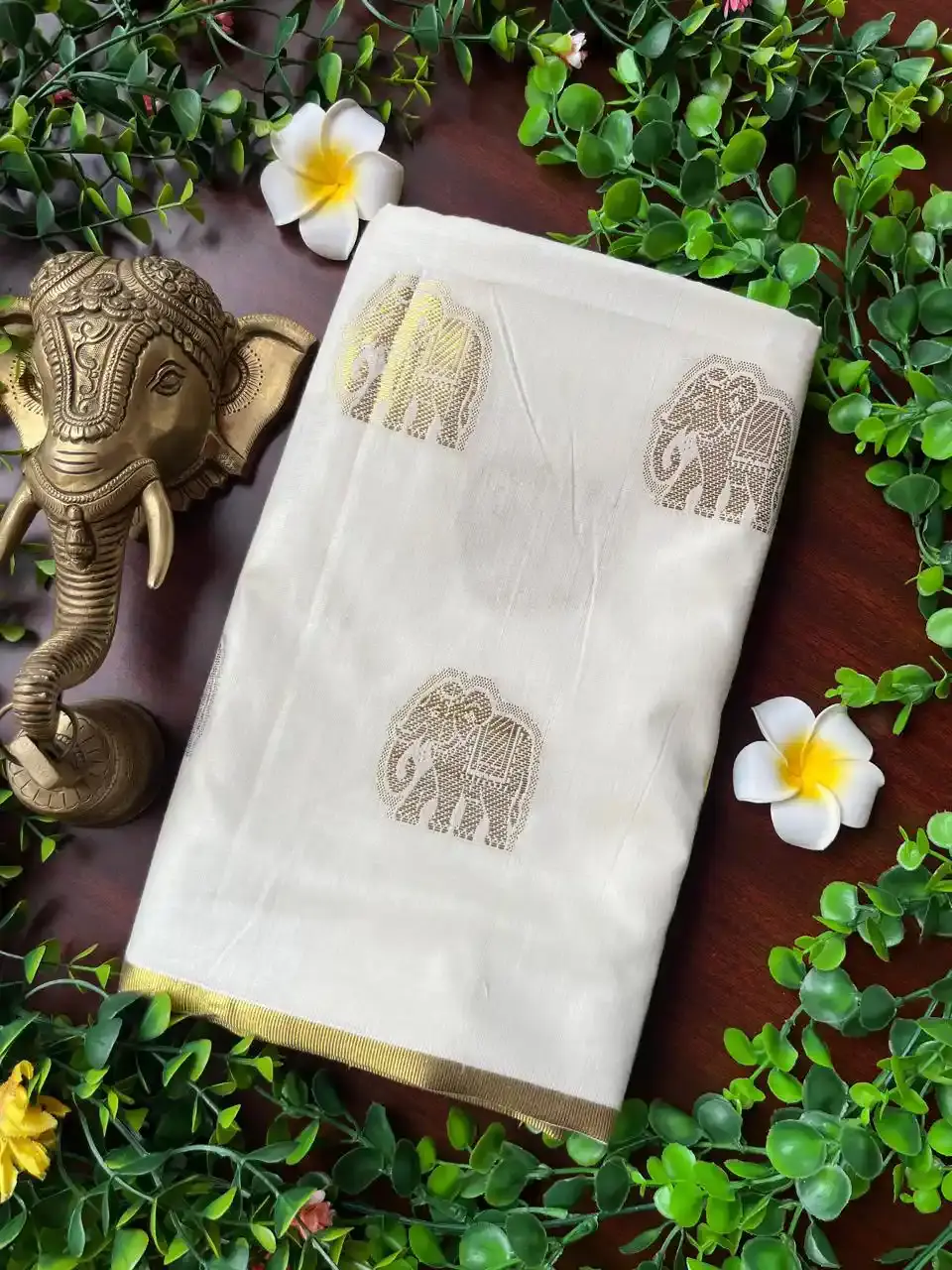 Golden Gajah Jacquard Stripe Cotton Kerala Kasavu Saree image Folded view