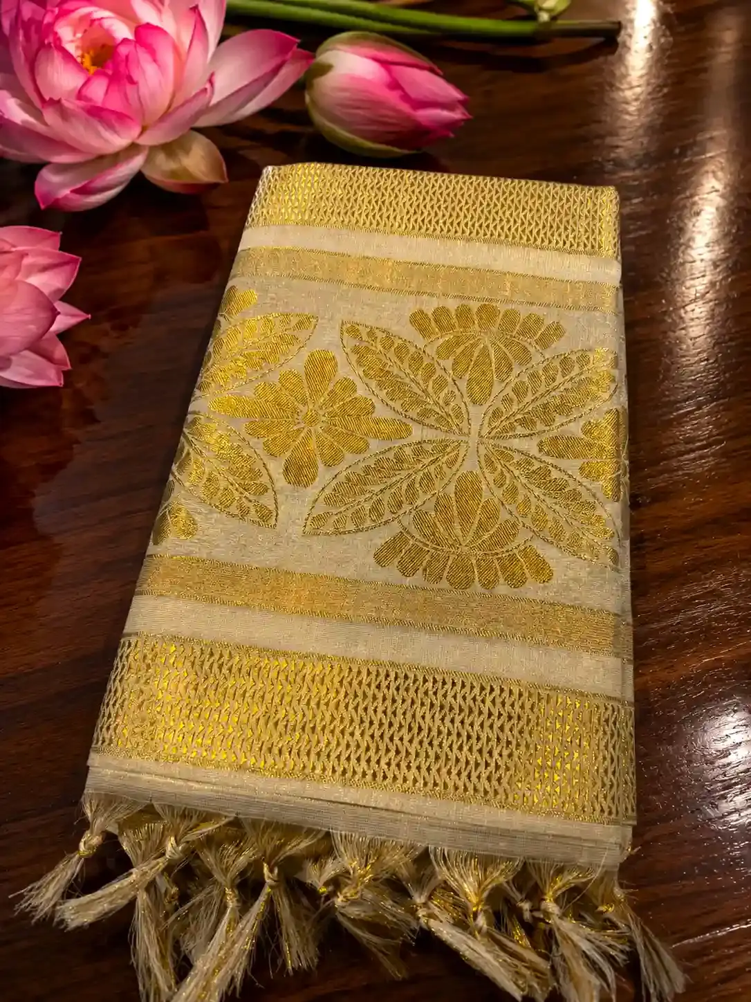 Balaramapuram Kasavu Saree with Floral Premium Zari Stripes image folded view