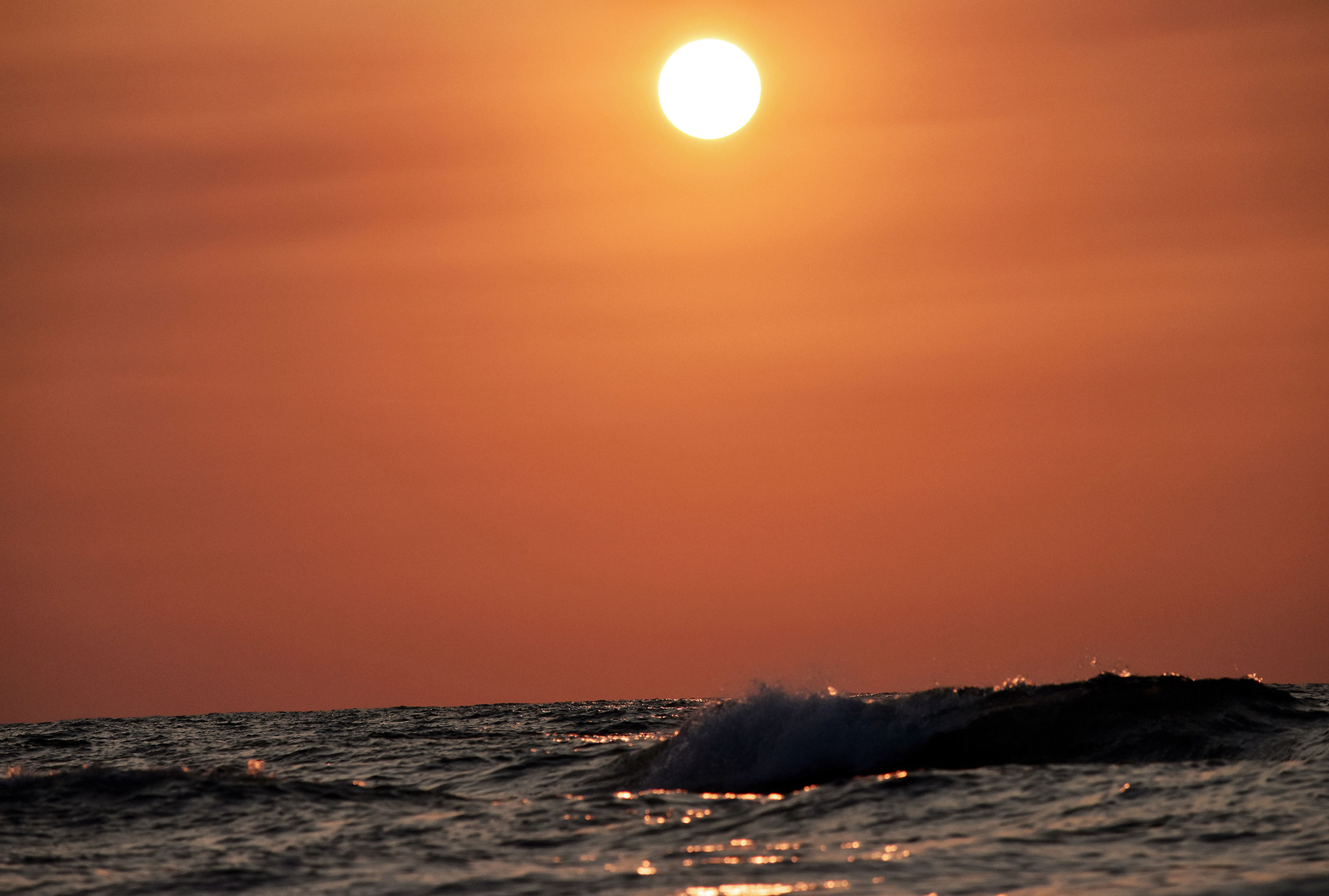 Waves of intensity, waves and sunset collide
