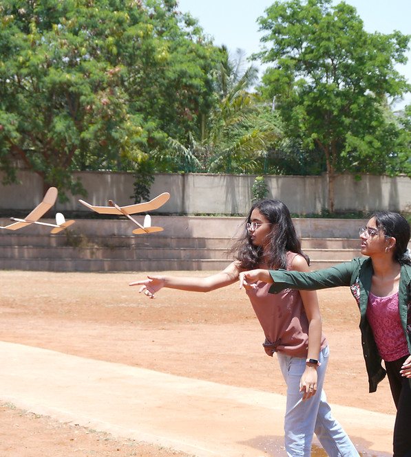 Students flying their hand-built gliders, at a Drone nuggets workshop