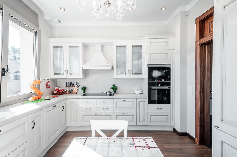 Example of professionally painted kitchen cabinets similar to Maple & Grain projects in Ann Arbor