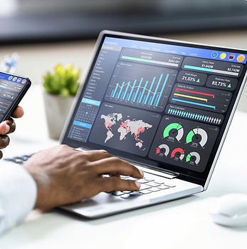 Person behind laptop showing data