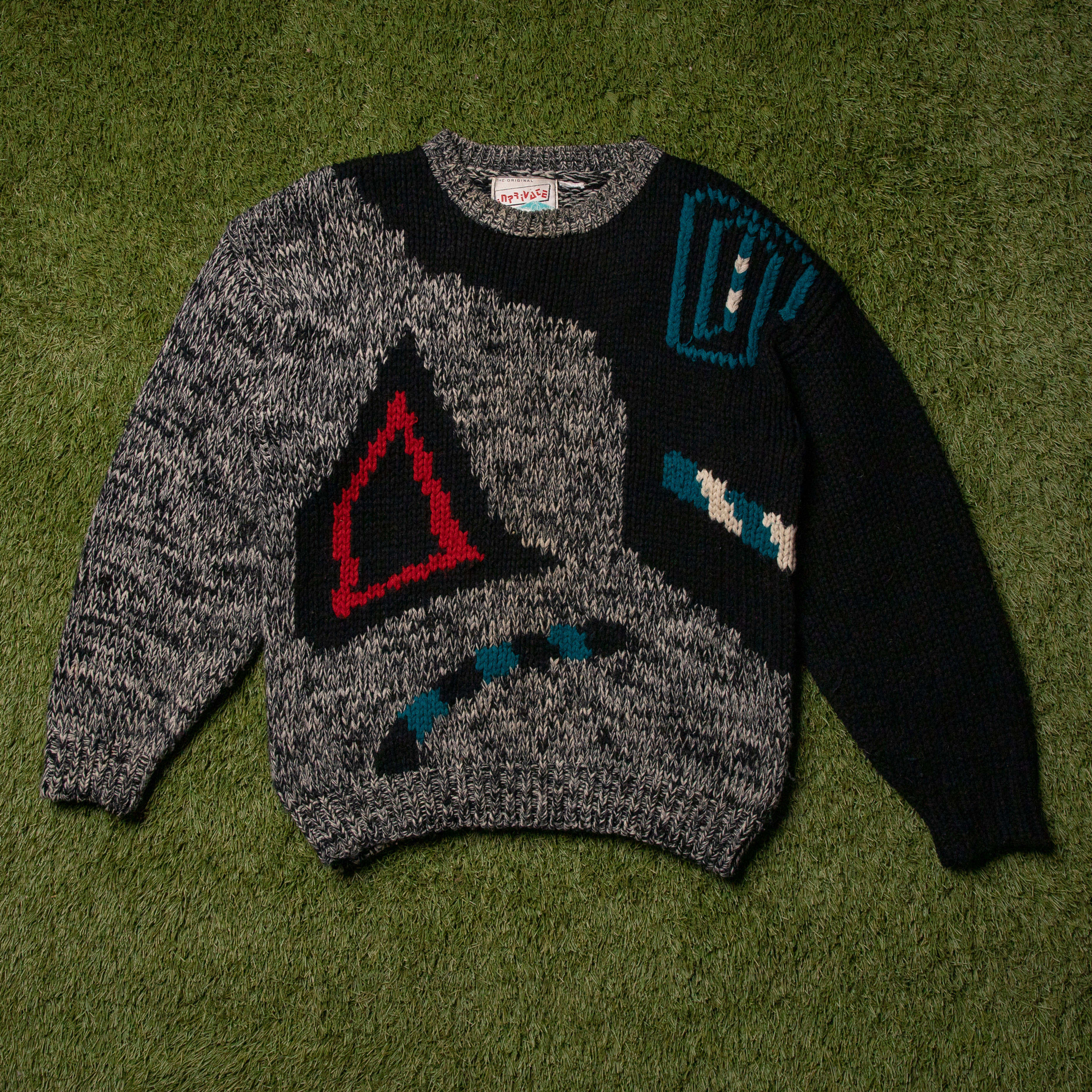 front shot of in private geometric knit sweater