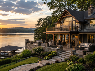 Upscale Norris Lake-style vacation home overlooking the lake at sunset, featuring a private dock, landscaped grounds, and outdoor living areas, representing vacation home property watch and year-round property care services.