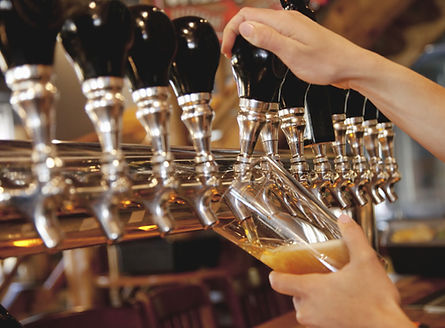 Beer Taps Pouring