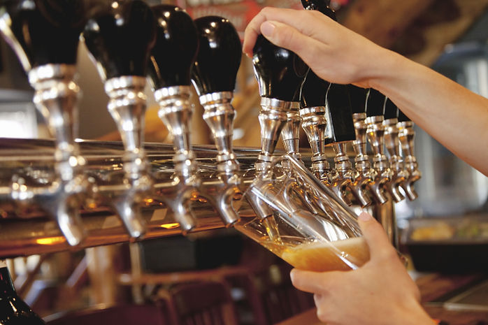 Beer Taps Pouring