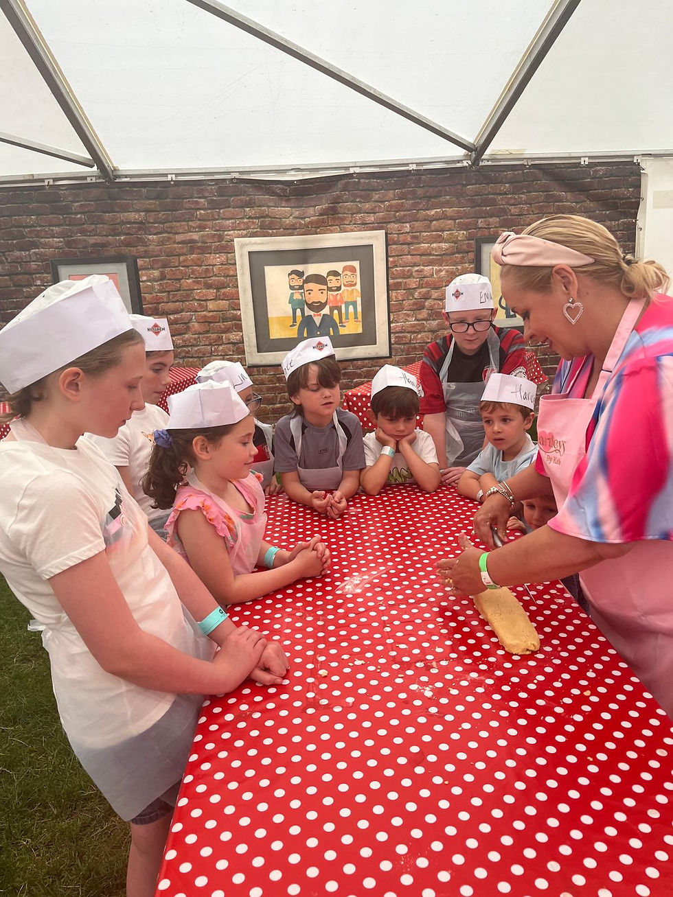 Katie Wellington teaching children to cook