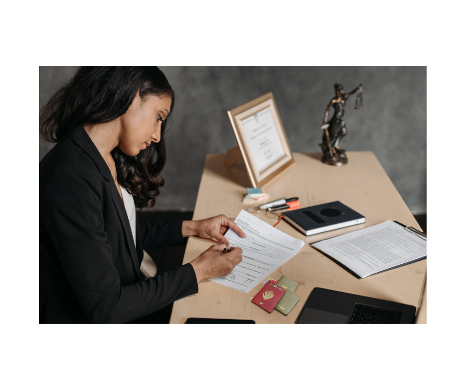 A woman completing an application form