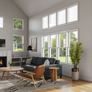Living room with cathedral ceilings and an abundance of windows