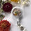Thumbnail: Wild Rose, Forget Me Nots, Viola + Queen Anne’s Lace Botanical Badge Buddy
