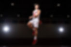 Basketball player mid-jump for sports team photography packages