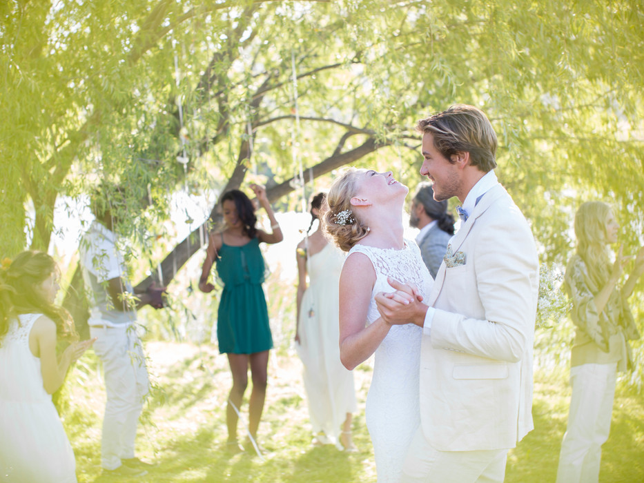 Couple dancing at an outdoor estate wedding celebration.