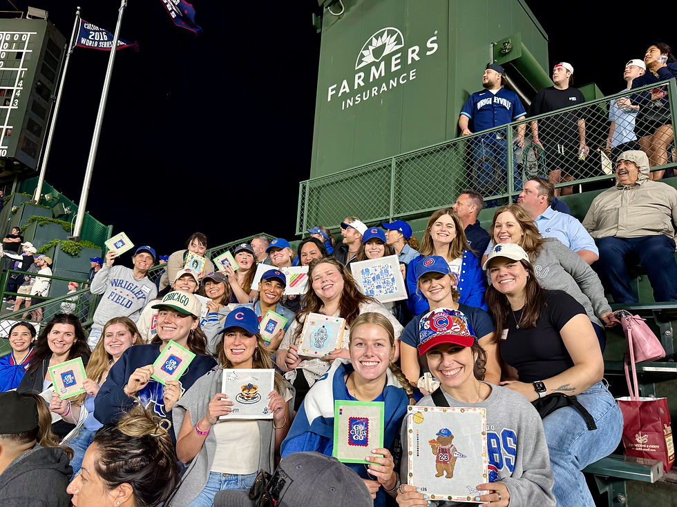 (photo of Old Town Stitch Club stitching at a Chicago Cubs game)