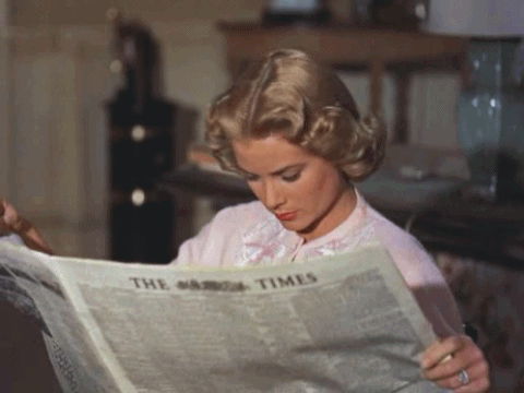 Grace Kelly reading The Times.gif