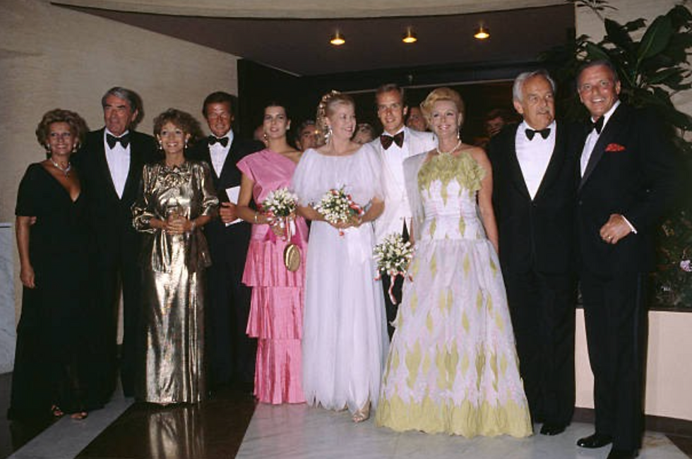 1980 Monaco Red Cross Ball From left to right: Luisa Mattioli, Gregory Peck and his wife Veronique Passani, Sir Roger Moore, Princess Caroline of Monaco, Princess Grace of Monaco,Prince Albert of Monaco, Barbara Sinatra, HSH PrinceRainier III of Monaco and Frank Sinatra attend the Red Cross Ball. Photo Credit: James Andanson/Sygma via Getty Images
