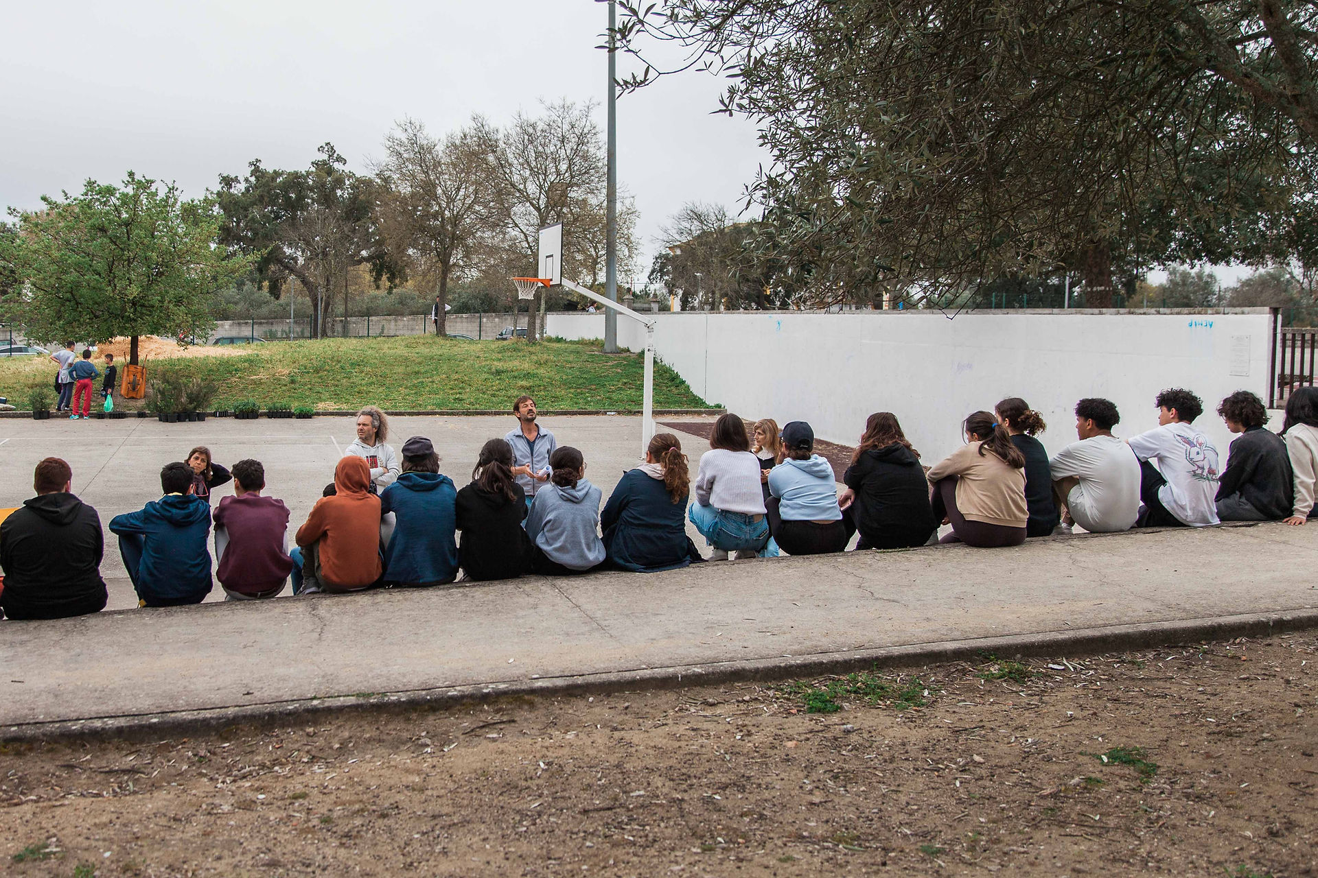 Forest Impact team briefs student before planting Miyawaki forest inside a school in Portugal