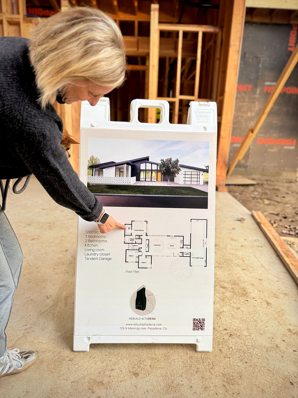 Nicole Pointing To Her Walk In Closet