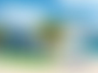 Royal Caribbean cruise ship docked at Labadee, Haiti with colorful Labadee sign, palm trees, and turquoise Caribbean water.