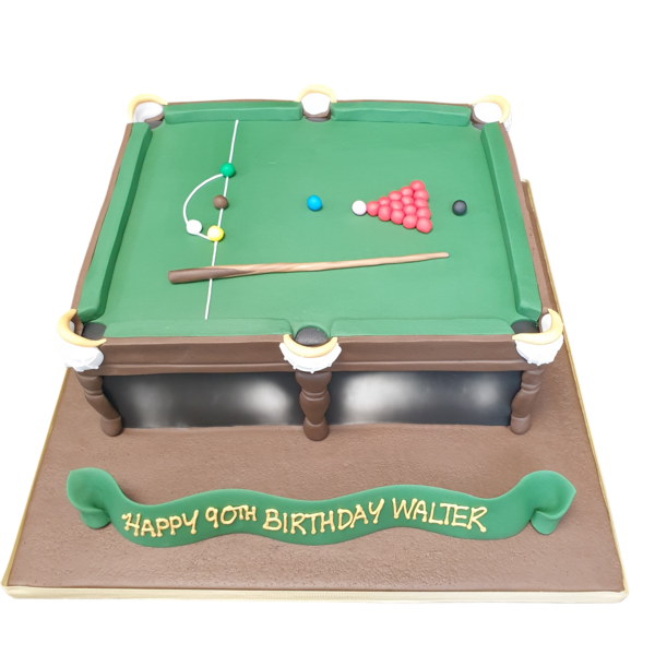 Bespoke snooker table cake with green fondant, colorful balls, and cues, crafted for celebration in Solihull, West Midlands.