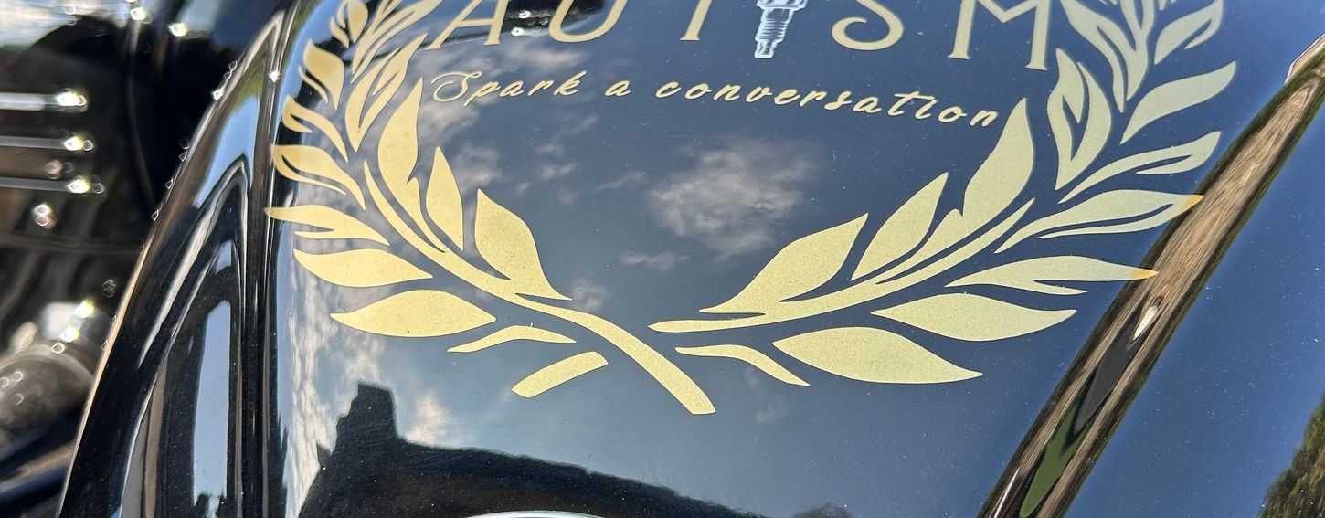 Ride for autism graphic on the sidecar