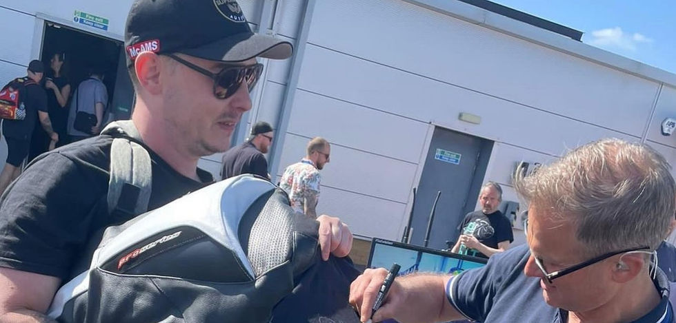 Baz is getting our merch signed -James Whitham (x2 British Superbike Champion)